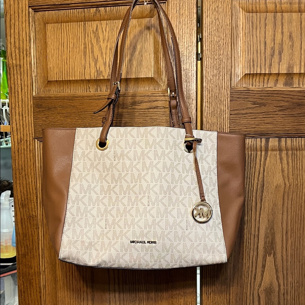 Michael Kors Beige Logo Tote with Brown Leather Panels. Beautiful bag